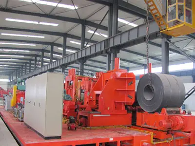 Steel coil dismantling machine